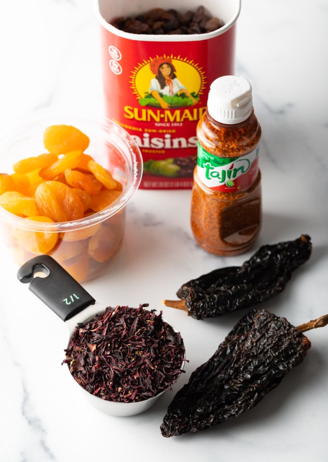 Ingredients needed: dried peppers, hibiscus, apricots, raisins, and tajin.