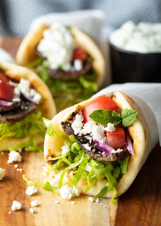 Homemade lamb gyro recipe wrapped in paper parchment.