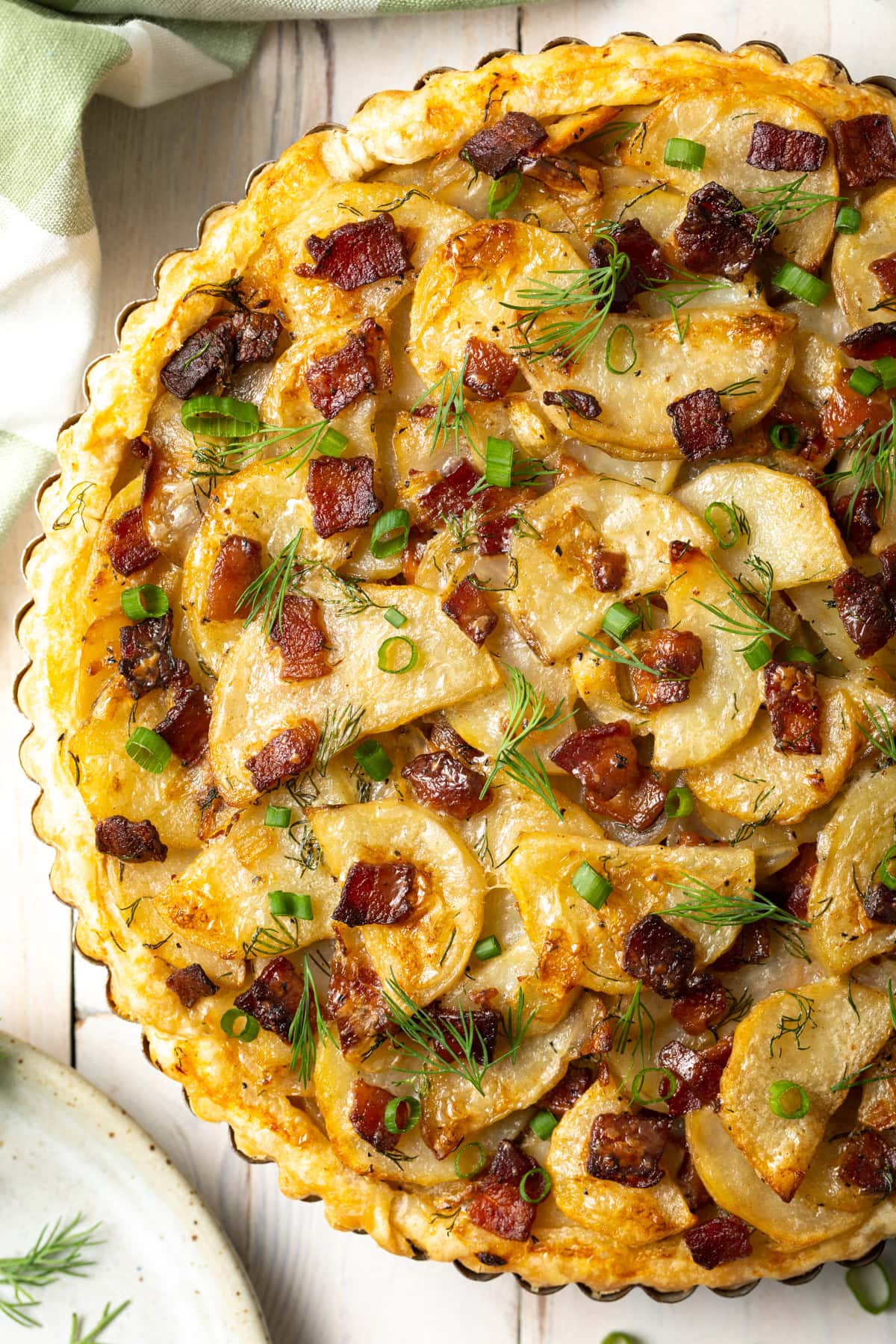 Overhead shot of Irish potato pie in a tart tin.