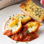 How To Make Ricotta Stuffed Shells Recipe #ASpicyPerspective #stuffed #shells #ricotta #holiday #italian #comfortfood #pasta #baked #slowcooker #crockpot